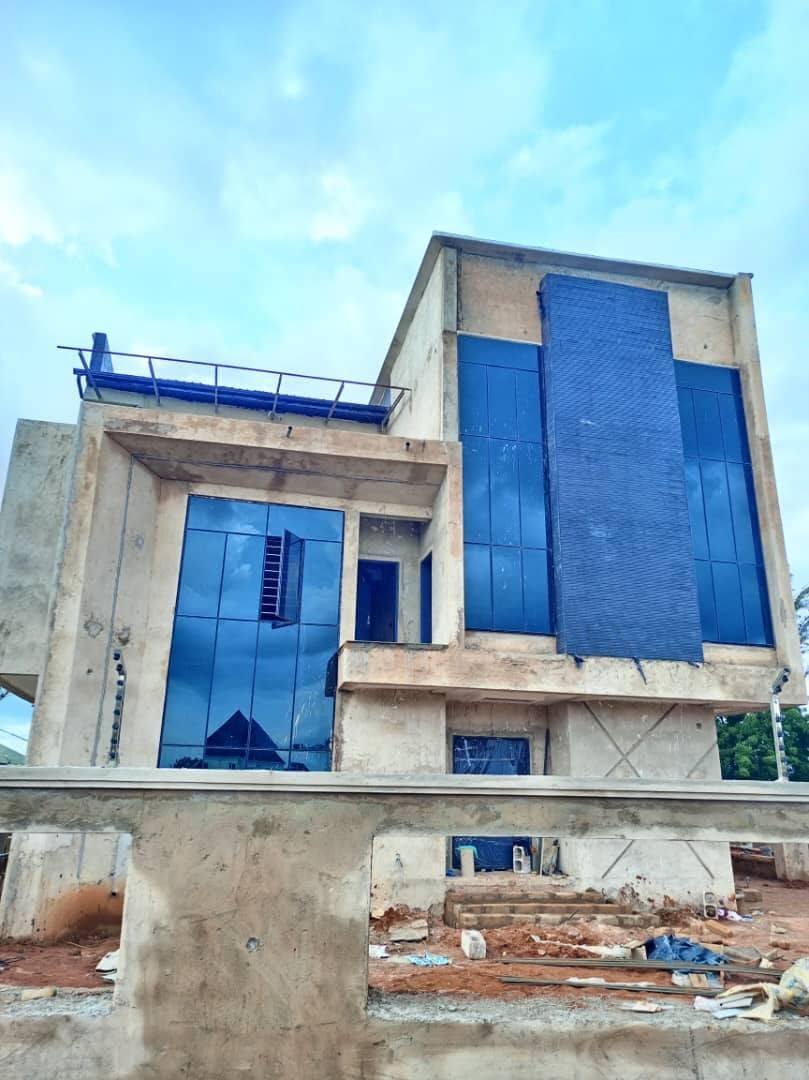 Second duplex mid-construction with scaffolding