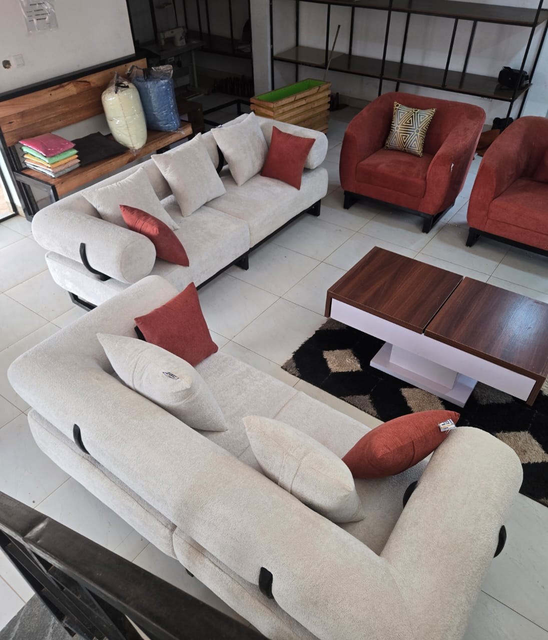 Curved White Showroom Lounge by IGC Construction Company Ltd