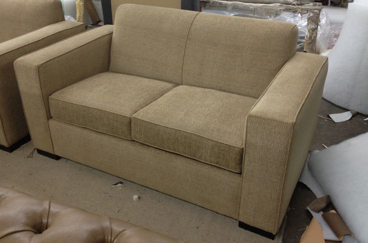 Tan Two-Seater Sofa by IGC Construction Company Ltd