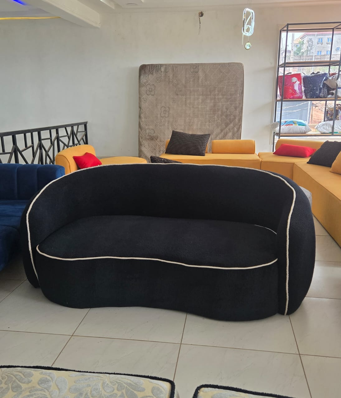 Black Curved Statement Sofa by IGC Construction Company Ltd