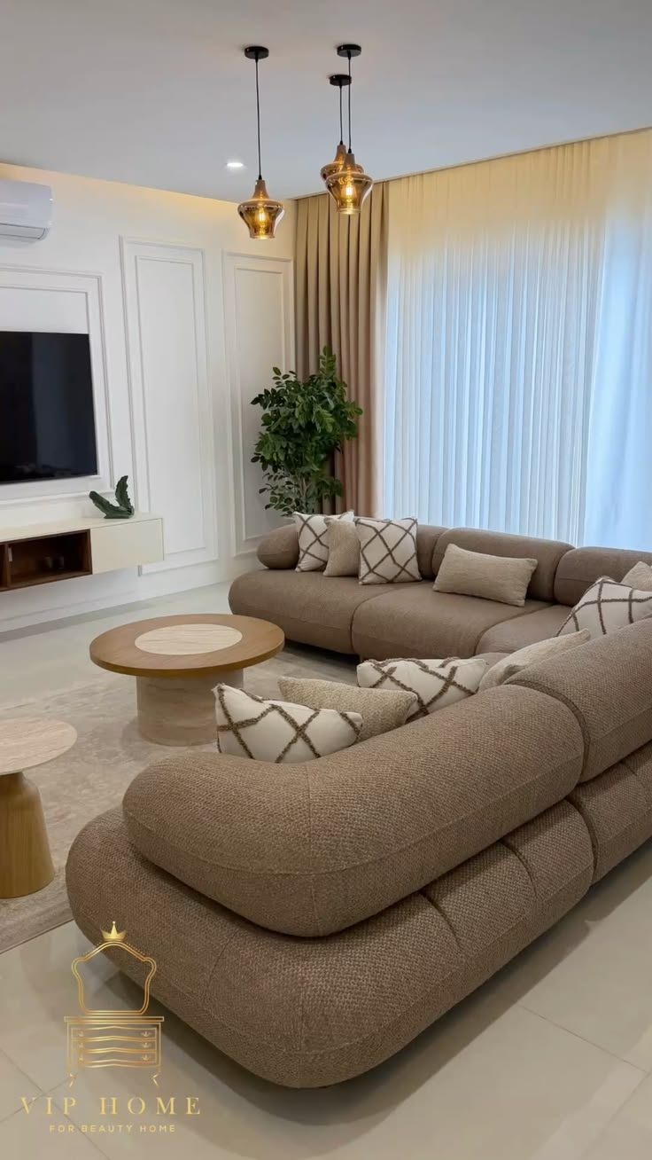 Neutral Curved Sectional Lounge by IGC Construction Company Ltd