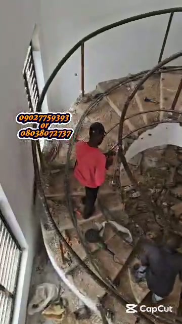 Curved staircase renovation in progress