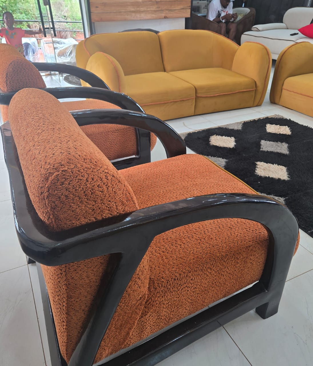 Timber-Framed Rust Accent Chair by IGC Construction Company Ltd